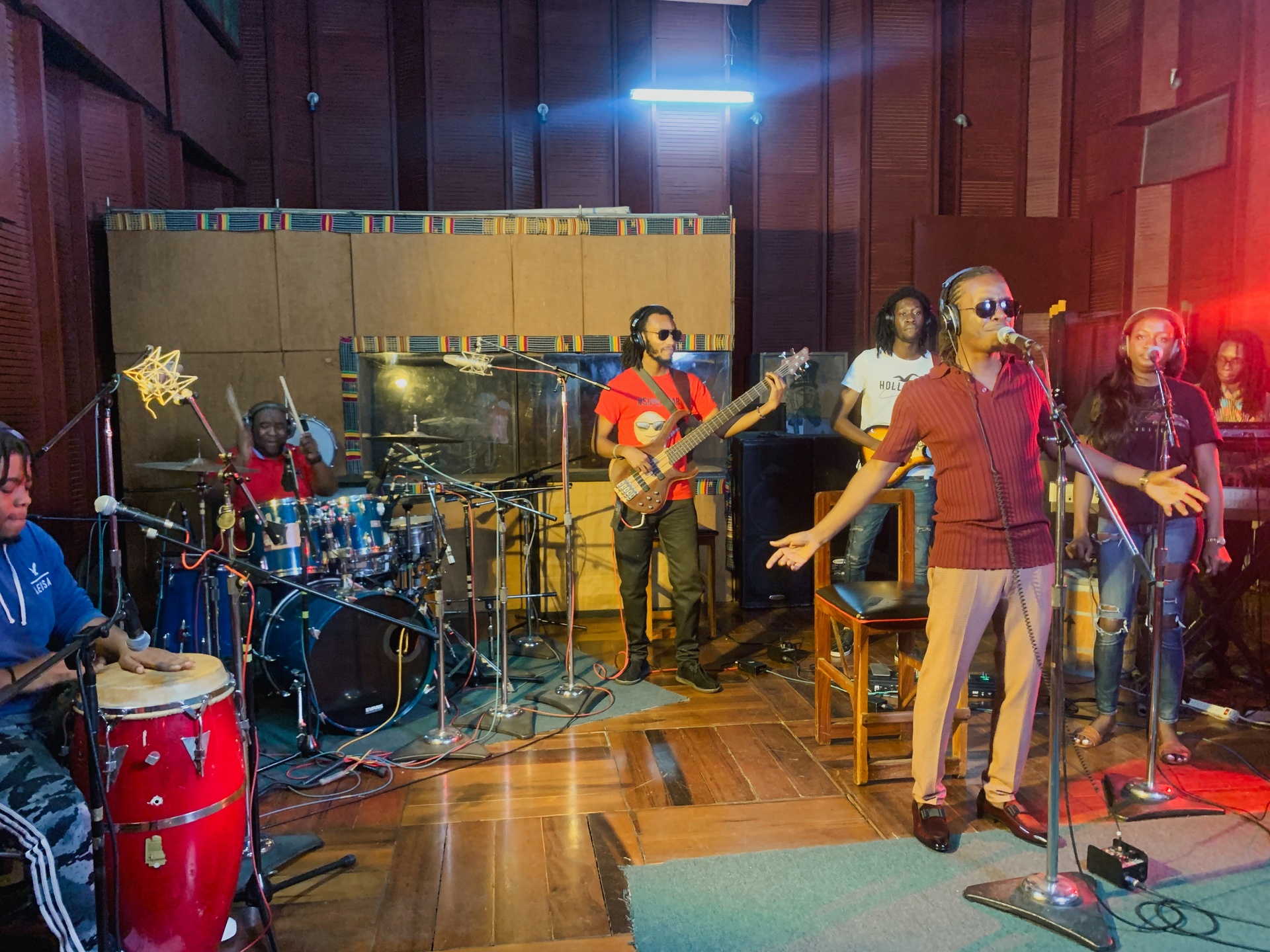 Claudius England performing with RedTones Band in studio